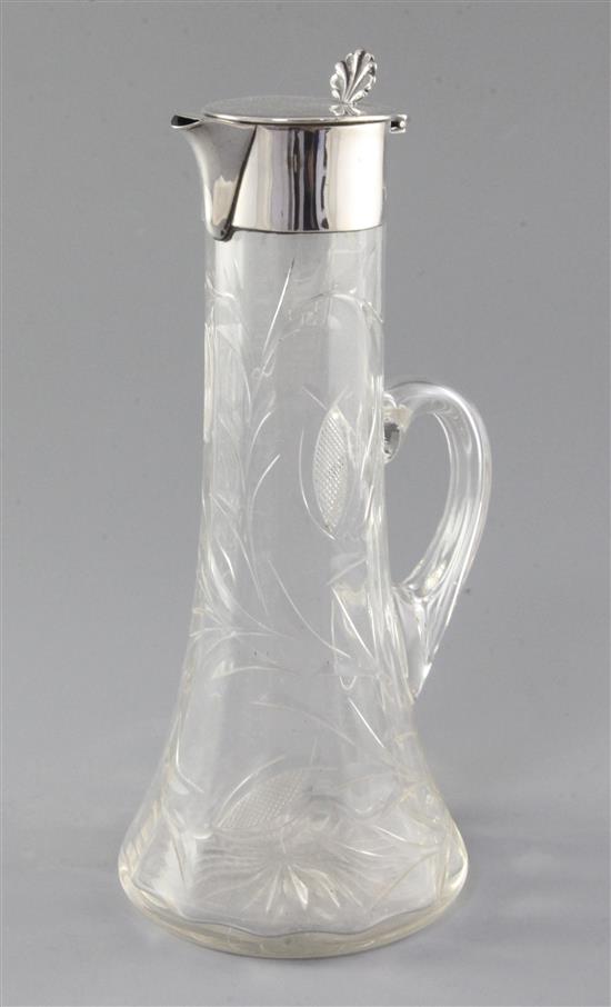 An Edwardian silver mounted cut glass claret jug by Robert Pringle & Sons, height 25cm.